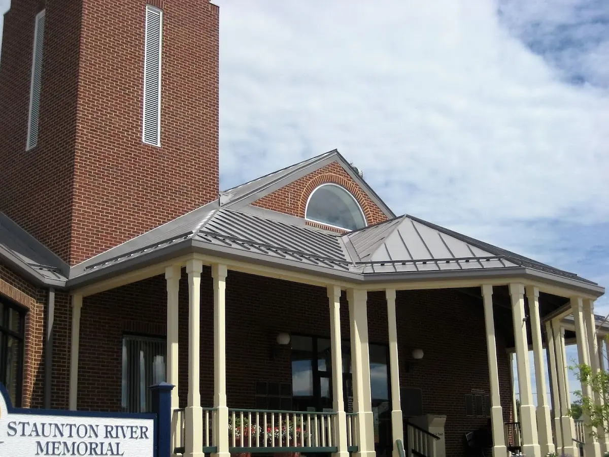 Skilled roofing craftsmen working on a residential roof in McClimansville